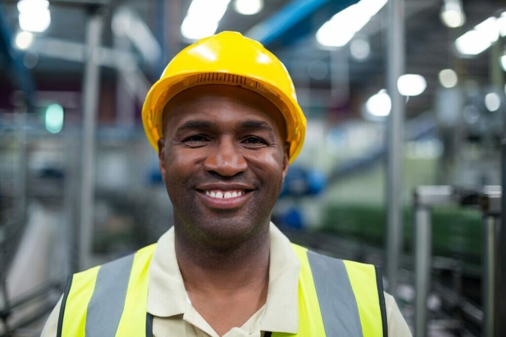 Portrait of smiling factory worker